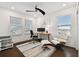 Bright home office with windows and a view of the marina at 3027 Bermuda Sloop Cir, Ruskin, FL 33570