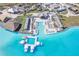Aerial view of Crystal Lagoon amenity and clubhouse at 31814 Oyster Trellis Ln, Wesley Chapel, FL 33545