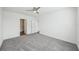 Spacious bedroom featuring ceiling fan and carpet flooring at 31814 Oyster Trellis Ln, Wesley Chapel, FL 33545