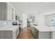 Modern kitchen with stainless steel appliances and an island at 31814 Oyster Trellis Ln, Wesley Chapel, FL 33545