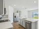 Modern kitchen with stainless steel appliances and white countertops at 31814 Oyster Trellis Ln, Wesley Chapel, FL 33545
