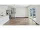 Modern kitchen with stainless steel appliances and breakfast bar at 31814 Oyster Trellis Ln, Wesley Chapel, FL 33545
