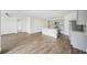 Modern kitchen with gray cabinets, island, and stainless appliances at 31814 Oyster Trellis Ln, Wesley Chapel, FL 33545