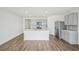 Modern kitchen with stainless steel appliances and an island at 31814 Oyster Trellis Ln, Wesley Chapel, FL 33545