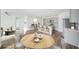 Modern kitchen with island, breakfast bar, and gray cabinetry at 31814 Oyster Trellis Ln, Wesley Chapel, FL 33545