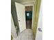 Open door view of bathroom and bedroom at 34212 Canal N Dr # B, Pinellas Park, FL 33781