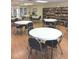 Community room with tables, chairs, and a library at 34212 Canal N Dr # B, Pinellas Park, FL 33781