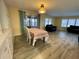 Dining area with table, chairs, and access to patio at 34212 Canal N Dr # B, Pinellas Park, FL 33781
