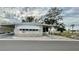 Front view of a charming manufactured home with carport and stone accents at 34212 Canal N Dr # B, Pinellas Park, FL 33781