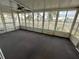 Spacious sunroom with ceiling fan and ample natural light at 34212 Canal N Dr # B, Pinellas Park, FL 33781