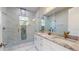 Elegant bathroom featuring granite countertops, a walk-in shower, and stylish fixtures at 3515 55Th Ave N, St Petersburg, FL 33714