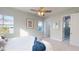 Bright bedroom with ensuite bathroom access, plush carpet, and large windows at 3515 55Th Ave N, St Petersburg, FL 33714