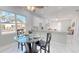 Open concept kitchen with breakfast bar and view into living area at 3515 55Th Ave N, St Petersburg, FL 33714