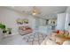 Open concept living room with kitchen, neutral colors and modern decor at 3515 55Th Ave N, St Petersburg, FL 33714