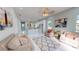 Open concept living room and kitchen with light walls and modern furnishings at 3515 55Th Ave N, St Petersburg, FL 33714