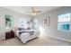 Main bedroom with a king-size bed and neutral decor at 3515 55Th Ave N, St Petersburg, FL 33714