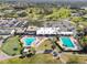 Community pool, clubhouse, and golf course at 3624 Muirfield Ct, New Port Richey, FL 34655