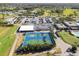 Aerial view of community amenities including tennis and pickleball courts at 3624 Muirfield Ct, New Port Richey, FL 34655