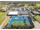 Aerial view of tennis and pickleball courts at 3624 Muirfield Ct, New Port Richey, FL 34655