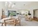 Bright dining area with wooden table and chairs at 3624 Muirfield Ct, New Port Richey, FL 34655