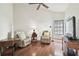 Relaxing Gathering room with two comfy armchairs and hardwood floors at 3624 Muirfield Ct, New Port Richey, FL 34655