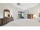 Main bedroom with patio access and ample closet space at 3624 Muirfield Ct, New Port Richey, FL 34655