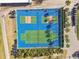 Overhead view of well-maintained pickleball and tennis courts at 3624 Muirfield Ct, New Port Richey, FL 34655