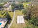 Aerial view of a sand volleyball court at 3624 Muirfield Ct, New Port Richey, FL 34655