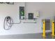 Garage with EV charger, electrical panel, and solar system at 3715 Front Park Dr, Wesley Chapel, FL 33543