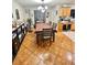 Dining room features tile flooring, a large table, and ample natural light at 37634 Hidden Park Ct, Dade City, FL 33525