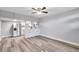 Open living room and kitchen with modern appliances at 4001 58Th N St # 26C, St Petersburg, FL 33709