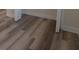 Wood-look vinyl plank flooring in a hallway at 405 Laguna Mill Dr, Ruskin, FL 33570