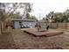 Spacious backyard with a large deck and a fenced-in area at 438 E Martin Luther King Jr Dr, Tarpon Springs, FL 34688
