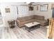 Living room with sectional sofa and coffee table at 438 E Martin Luther King Jr Dr, Tarpon Springs, FL 34688