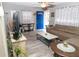 Living Room with sectional sofa, coffee table, and TV at 438 E Martin Luther King Jr Dr, Tarpon Springs, FL 34688