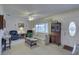 Bright living room featuring comfy seating, a coffee table, and hardwood floors at 4401 37Th N Ave, St Petersburg, FL 33713