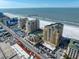 Aerial view of the building and surrounding area at 470 Mandalay Ave # 305, Clearwater Beach, FL 33767