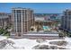 Aerial view showcasing the building and beach at 470 Mandalay Ave # 305, Clearwater Beach, FL 33767