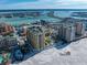 Aerial view of beachfront property with city and water views at 470 Mandalay Ave # 305, Clearwater Beach, FL 33767