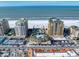 Aerial view of beachfront property with ocean and city views at 470 Mandalay Ave # 305, Clearwater Beach, FL 33767