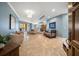 Spacious entryway with light tile floors and seating at 470 Mandalay Ave # 305, Clearwater Beach, FL 33767