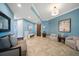 Bright entryway with seating and art at 470 Mandalay Ave # 305, Clearwater Beach, FL 33767