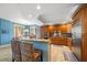 Bright kitchen featuring granite countertops, ample cabinetry, and stainless steel appliances at 470 Mandalay Ave # 305, Clearwater Beach, FL 33767