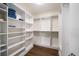 Large walk-in closet with ample shelving and hanging space at 470 Mandalay Ave # 305, Clearwater Beach, FL 33767