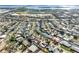 Wide aerial view of a neighborhood with the subject house highlighted at 5166 39Th S St, St Petersburg, FL 33711