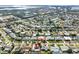 Aerial view showing a single-Gathering house among other homes, near the water at 5166 39Th S St, St Petersburg, FL 33711