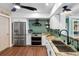 Updated kitchen with stainless steel appliances and granite countertops at 5166 39Th S St, St Petersburg, FL 33711