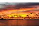 Breathtaking sunset over the water with city skyline in the distance at 5166 39Th S St, St Petersburg, FL 33711