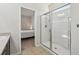 Bathroom with a large shower and view into bedroom at 5808 111Th E Ave, Parrish, FL 34219