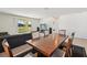 Dining area with a table and chairs adjacent to the kitchen and living room at 5808 111Th E Ave, Parrish, FL 34219